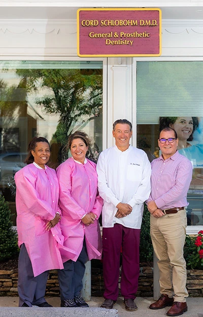 Dr. Cord Schlobohm with his dental team