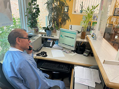 Dentist talking about finances for dental services
